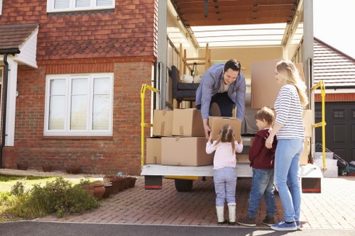 Loading furniture into a removal van on a Snaresbrook residential street