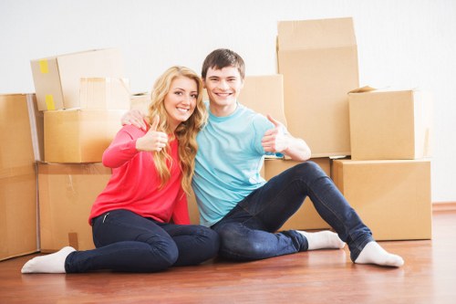 Office furniture dismantling and loading during a local business relocation