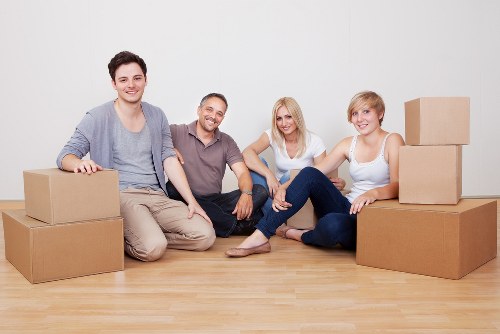 Professional movers loading belongings carefully for transport