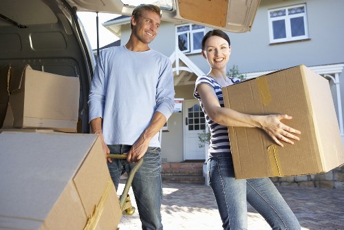 Packed office equipment and furniture ready for relocation